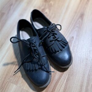 Clarks Black Fringe Women's Loafers